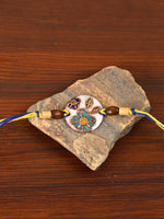 Handcrafted "Phool" Copper Enamel Rakhi by EkiBeki for sale