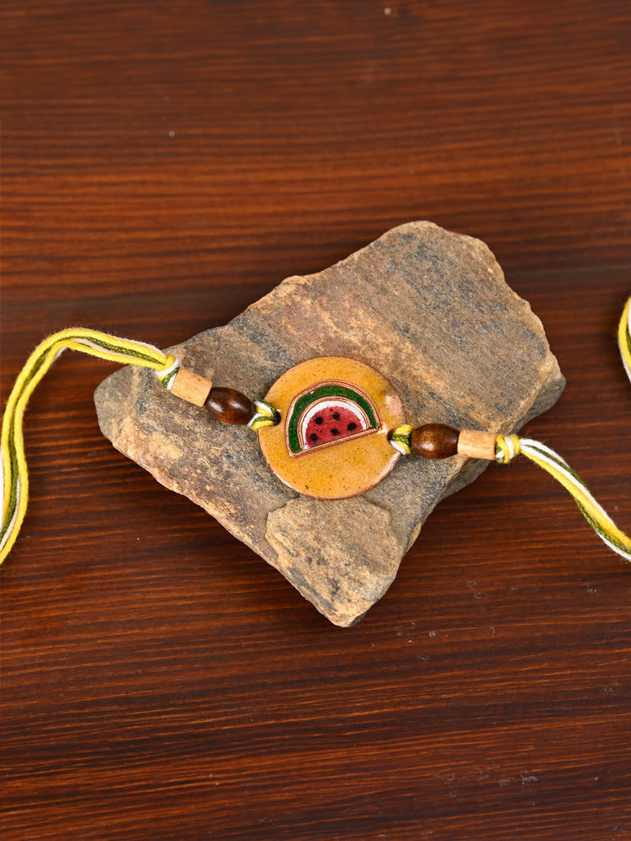 Shop Handcrafted "Tarbooz" Copper Enamel Rakhi by EkiBeki