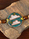 Buy Handcrafted "Baadal" Copper Enamel Rakhi by EkiBeki