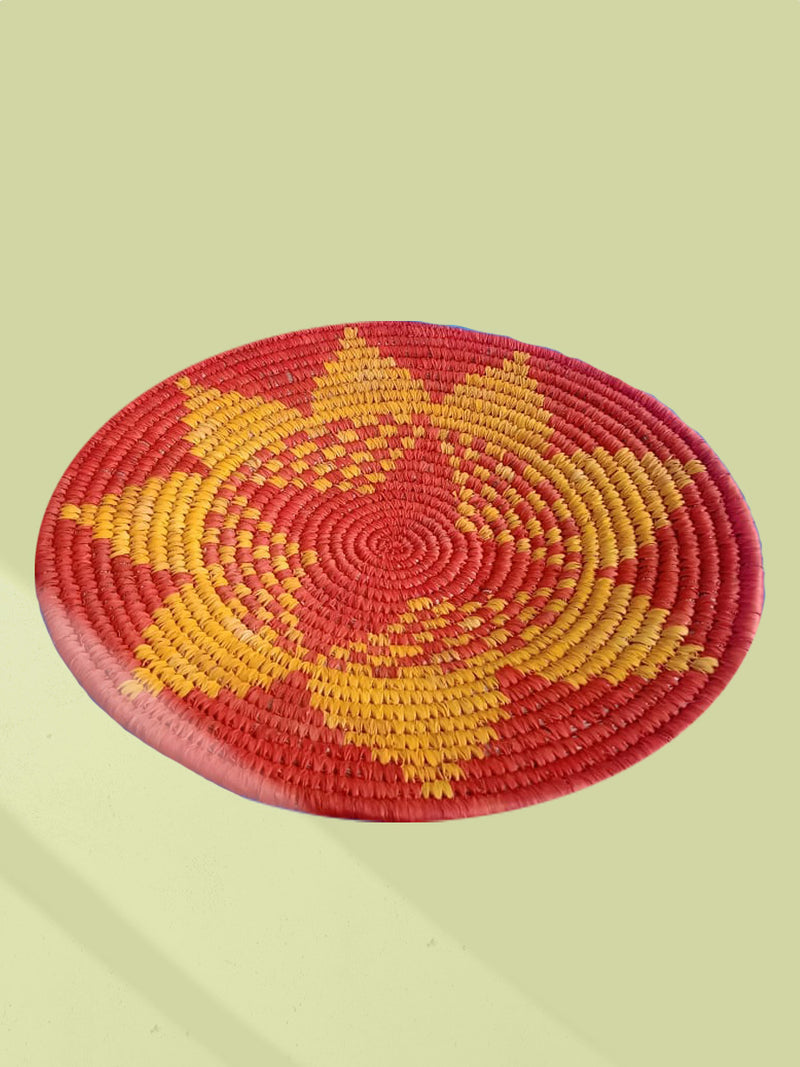 Shop Plate woven in Orange and yellow Sabari Grass Work by Dipali Mura