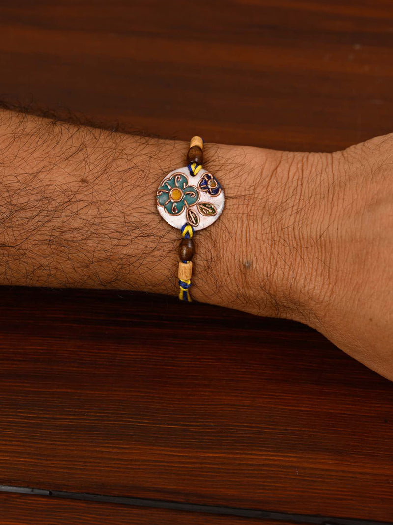 Handcrafted "Phool" Copper Enamel Rakhi by EkiBeki