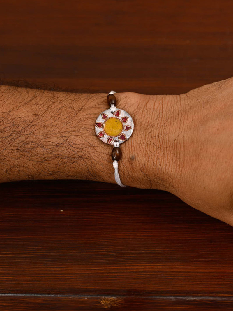 Handcrafted "Sooraj" Copper Enamel Rakhi by EkiBeki