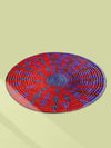 Shop Plate woven in shades of red and violet sabari grass work by Dipali Mura