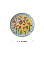 Blooming flowers on plate in Blue pottery 