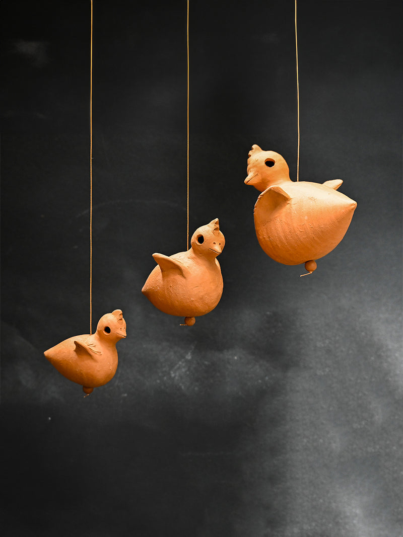 Terracotta Chick Wind Chime Ensemble by Dolon Kundu