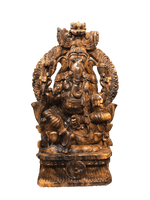 Eternal Blessings: The Wooden Carving of Lord Ganesh by K.P. Dharmaian