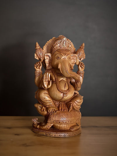 Shop Ganesha: Divine Guardian in Kadam Wood Carving by Om Prakash