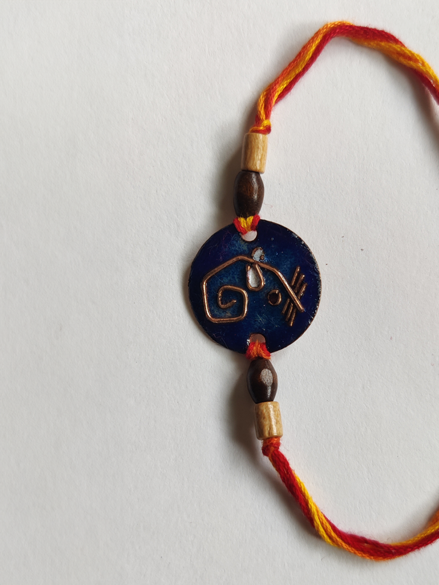 buy Handcrafted Geometric Ganesha Copper Enamel Rakhi by EkiBeki