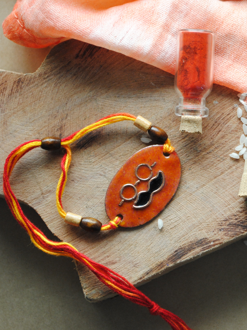 Shop Handcrafted "Mooch" Copper Enamel Rakhi by EkiBeki