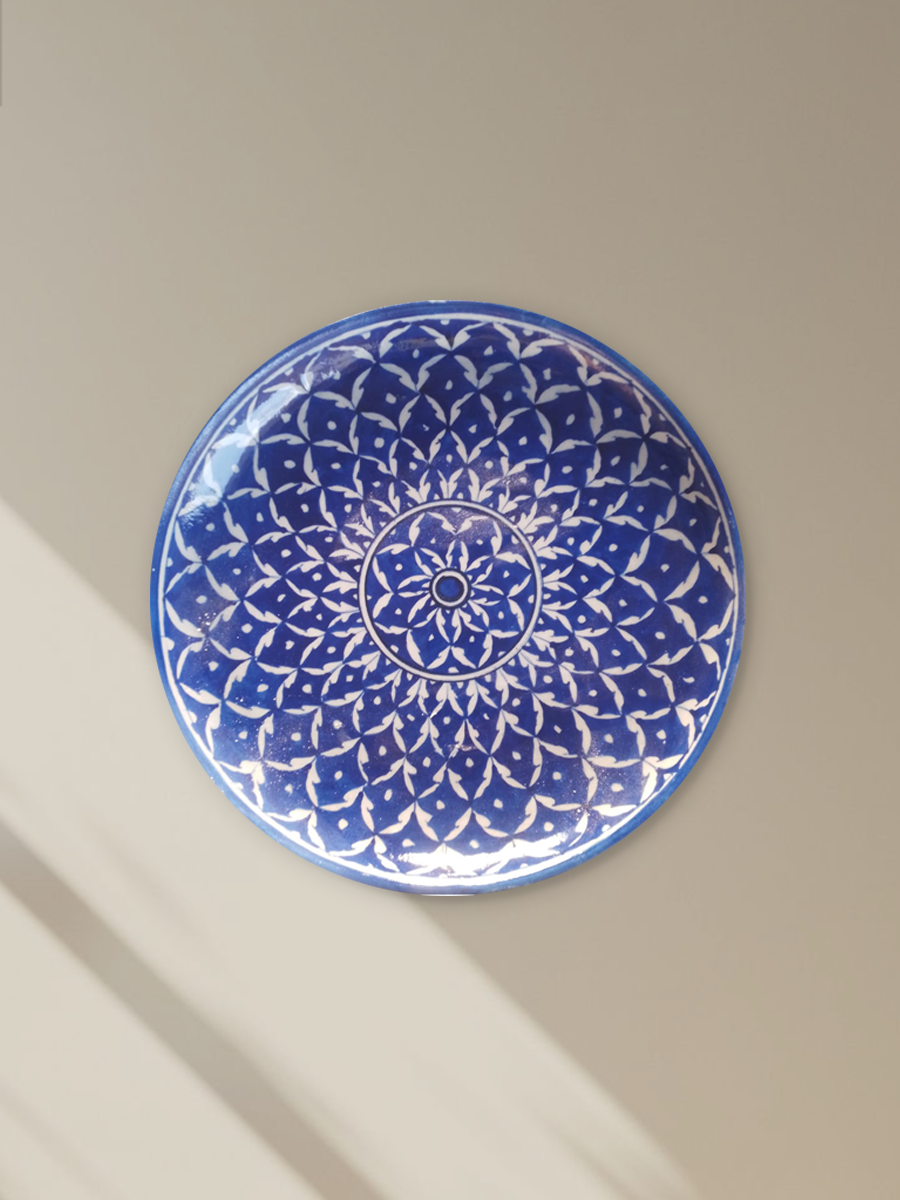 Shop Petal and leaf pattern on plate in Blue pottery