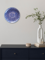 Petal and leaf pattern on plate in Blue pottery for sale