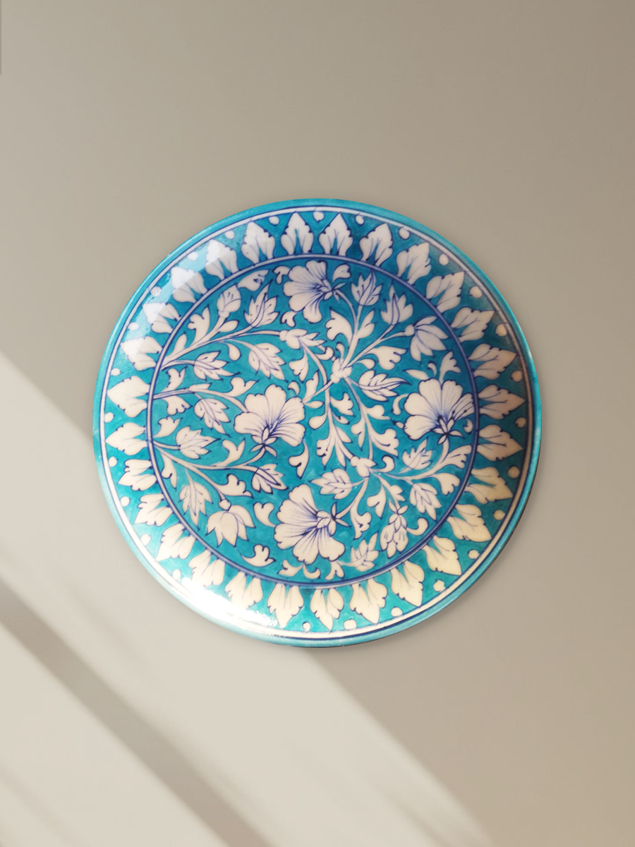 Shop Tendrils & Leaves design on a plate In Blue pottery