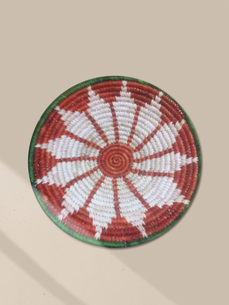 Shop Terracotta sunburst wall plate in sabari grass work by Dipali Mura