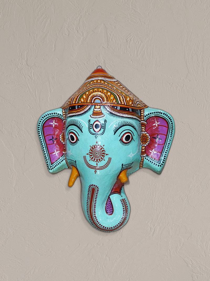 Complete your collection with the Transcending Hues: The Paper Mache Colorful Face of Ganesha - Purchase yours now!