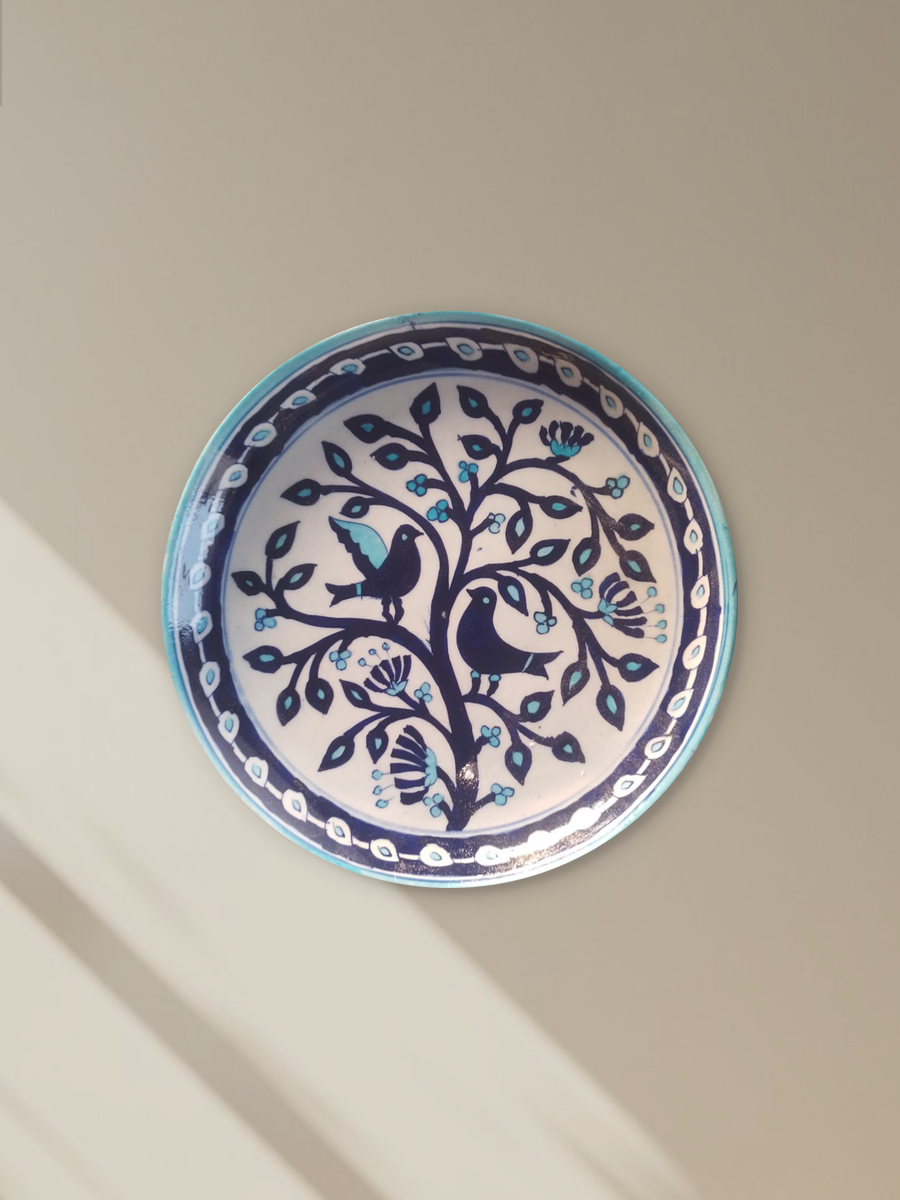 Shop Two birds stylized design on a plate In Blue Pottery'