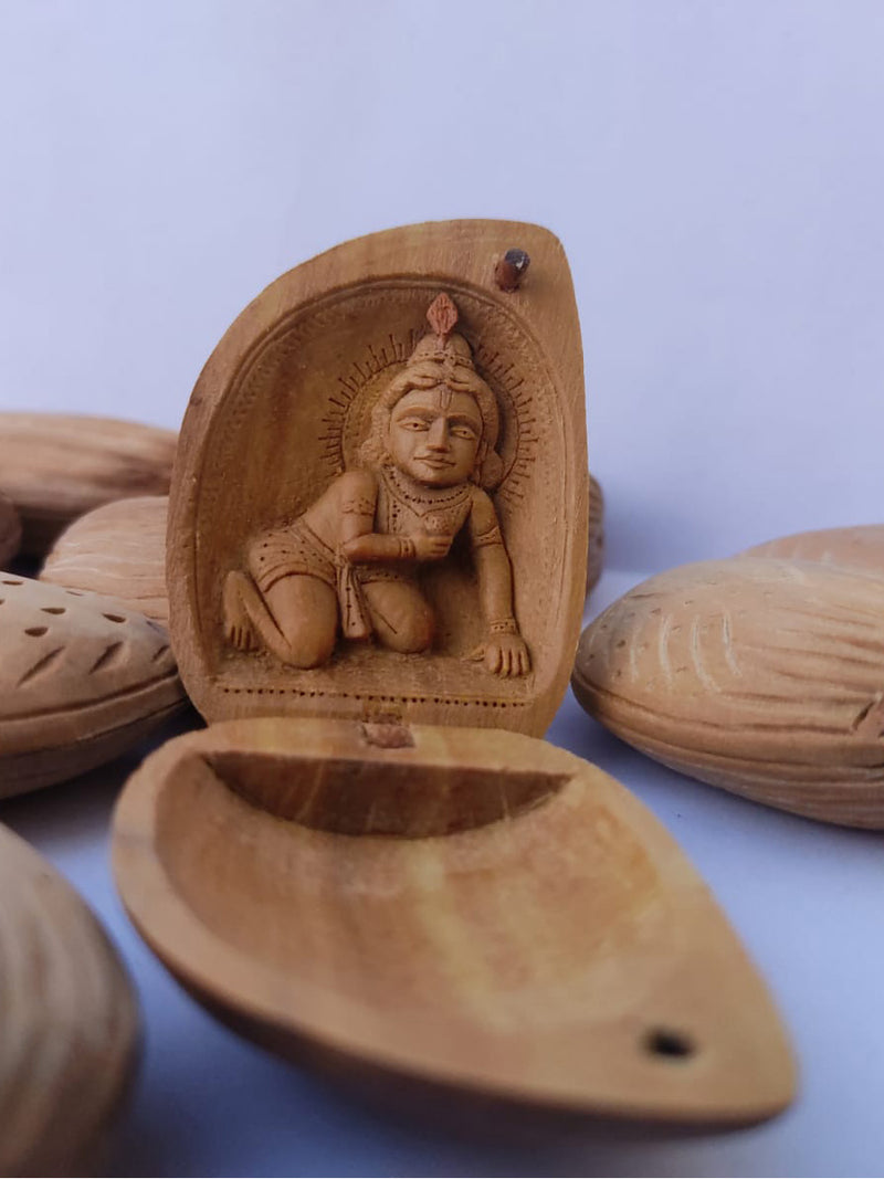 Baal Krishna Sandalwood Miniature Artwork by Om Prakash