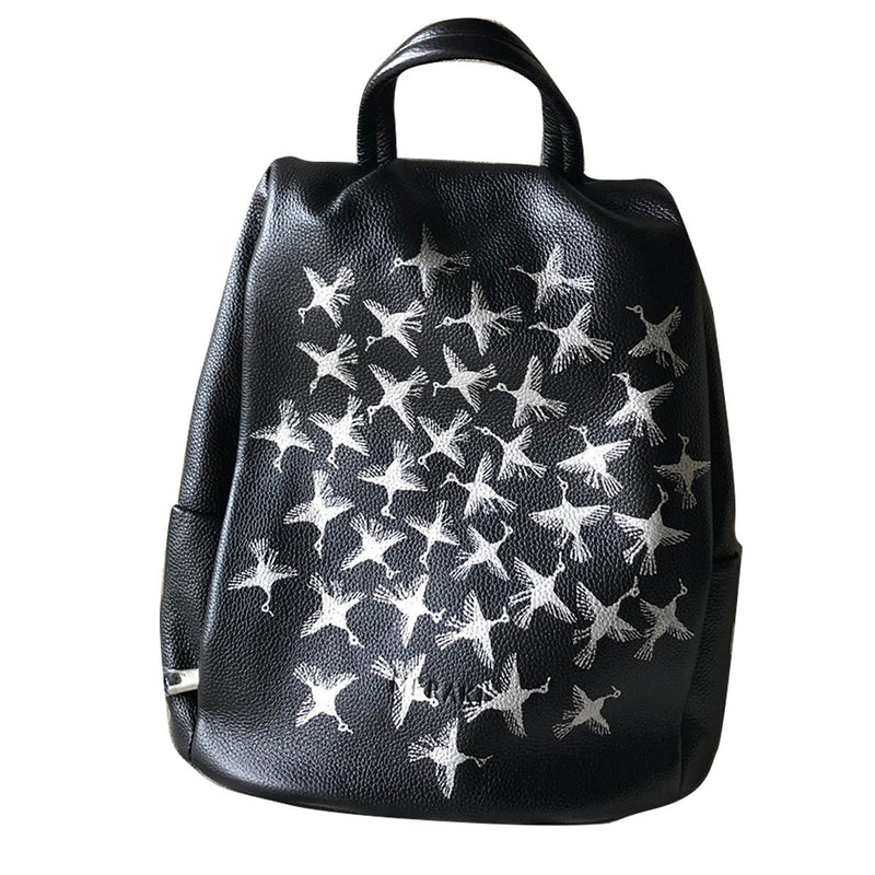 THE WHITE BIRDS , BLACK BACKPACK-